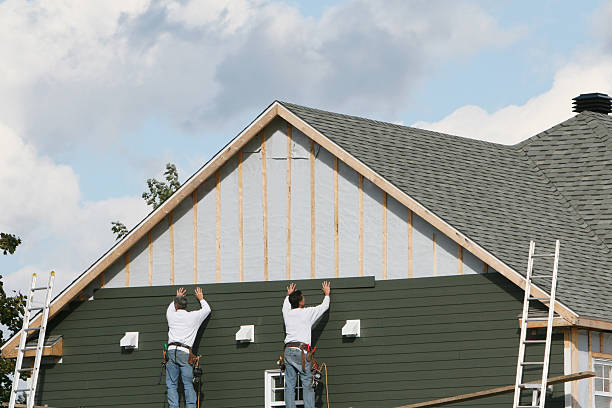 Professional Siding Contractor technician working in Westwood, NJ